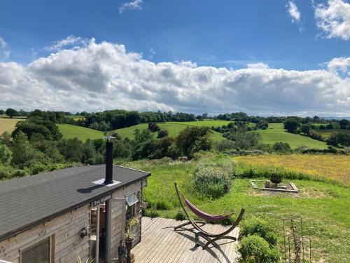 Overton-on-dee Ski Chalet | A charming unique lodge, with log burner and incredible views