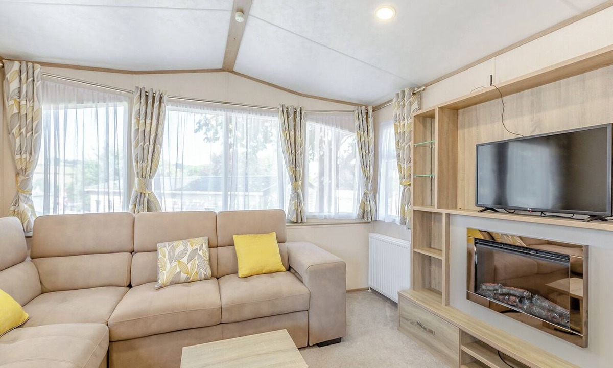 Axminster Apartment | Comfortable and modern 12ft-wide caravan with one double and one twin bedroom.