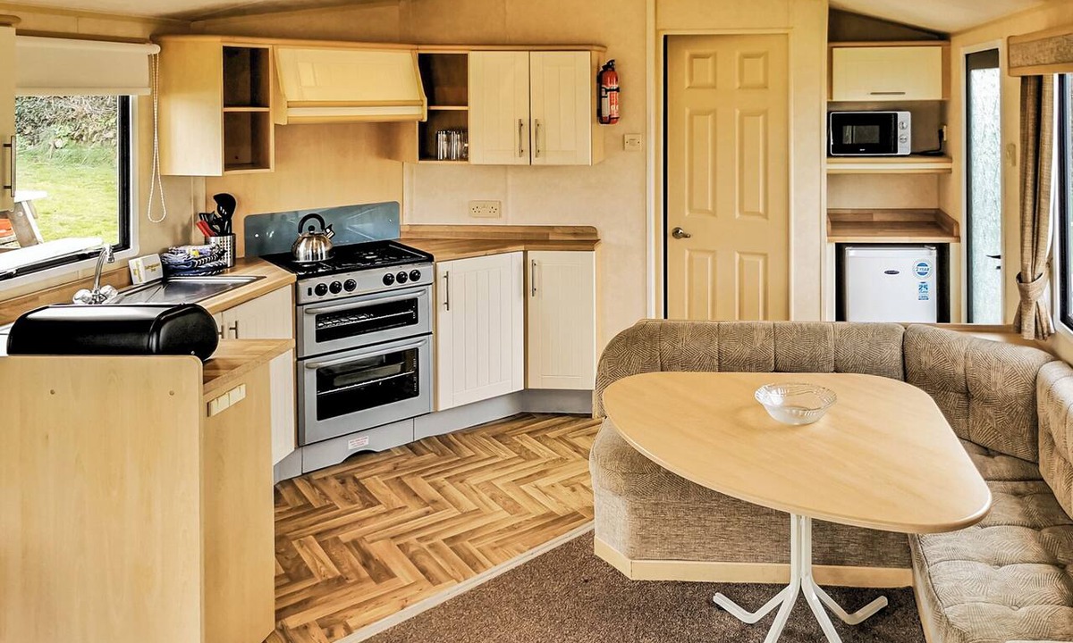 Perranporth House | Comfortable and spacious 12ft-wide caravan with one double and one twin.