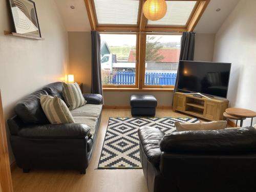 Scalloway House | Semi-detached bungalow with off street parking
