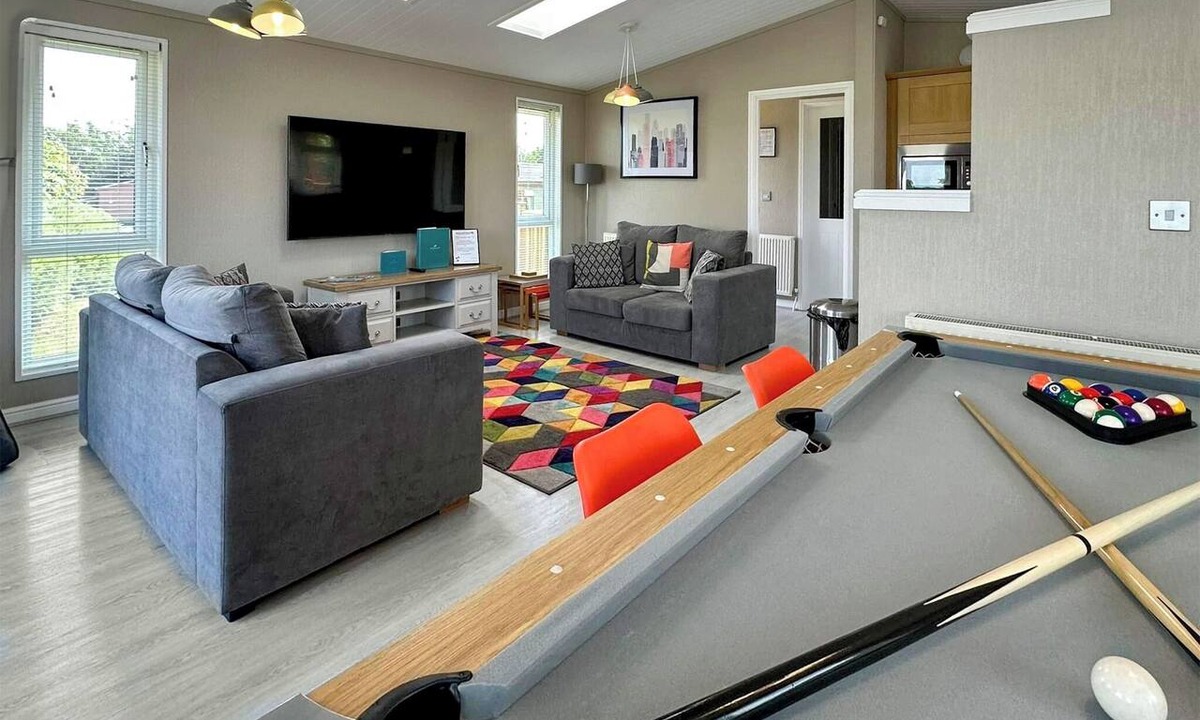 Raywell Ski Chalet | This deluxe two bedroom lodge even has its own games den.