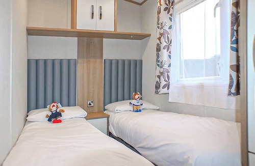 Wigton House | 12ft-wide caravan with one double and two twin.