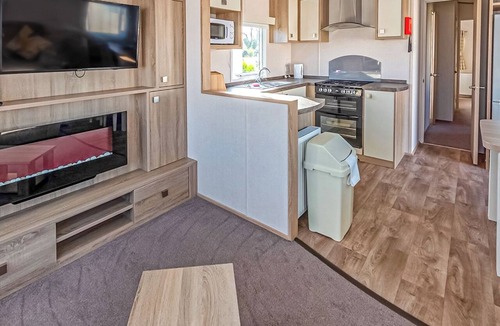 Wigton House | 12ft-wide caravan with one double and two twin.