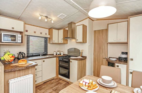Wigton House | 12ft-wide caravan with one double and two twin.