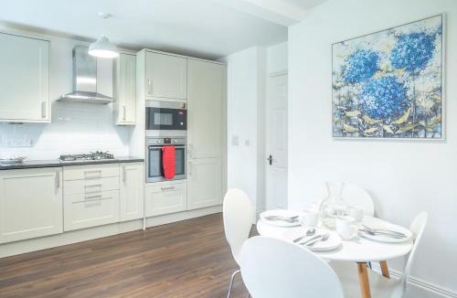 West Cliff Apartment | 3 bed, gf beachside apartment with parking and garden