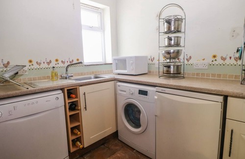 Pagham Cottage | 50 Harbour Road, is in Pagham.