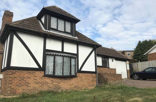 Woodingdean House | A village tranquil modern Tudor house sea views