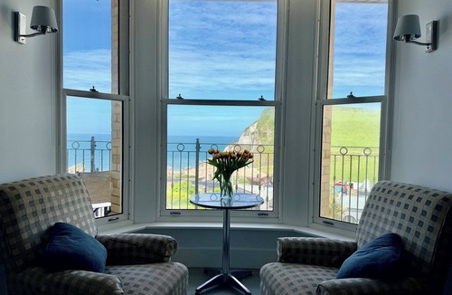 Hele Apartment | Arlington Villas. Modern 2 bedroom/2 bath flat with parking. Amazing ocean views