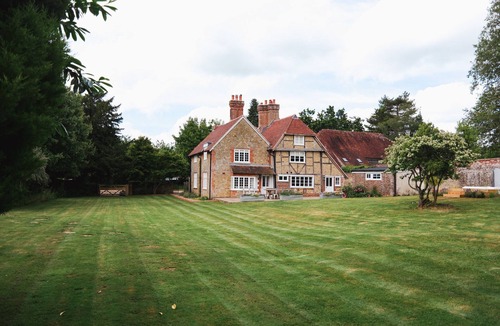 Easebourne Cottage | Challens Yarde is a large double fronted cottage, providing spacious, bright, and airy accommodation