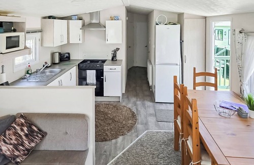 Hexham House | Comfortable 12ft-wide caravan with one double and two twin.