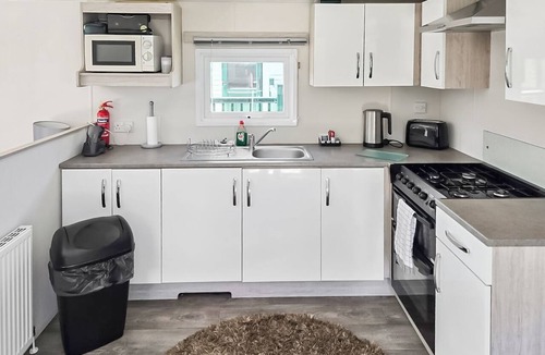 Hexham House | Comfortable 12ft-wide caravan with one double and two twin.