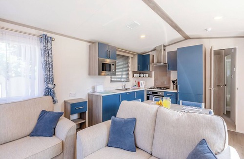 Axminster Apartment | Comfortable and modern 12ft-wide caravan with one double and one twin bedroom.