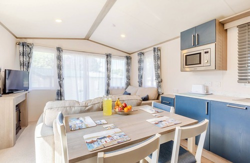 Axminster Apartment | Comfortable and modern 12ft-wide caravan with one double and one twin bedroom.