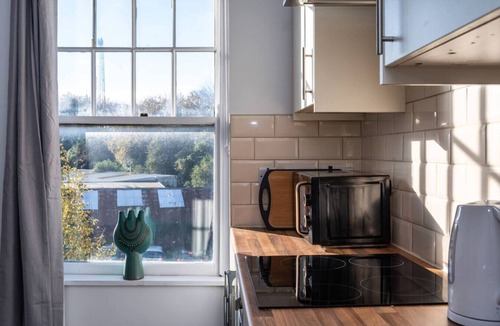 Neath Condo | Contractor Room Kitchen Central Spot