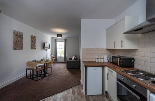 Neath Condo | Contractor Room Kitchen Central Spot