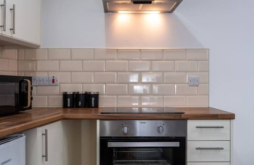 Neath Condo | Contractor Room Kitchen Central Spot