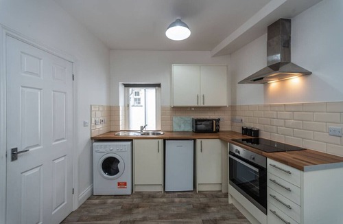 Neath Condo | Contractor Room Kitchen Central Spot