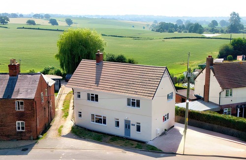 Malpas Cottage | Corner Cottage, Malpas: 4 Bedroom Village House with Parking