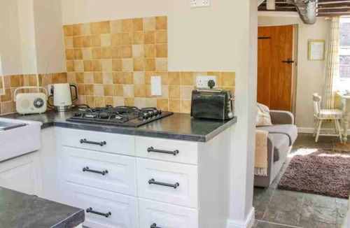 Ironbridge Cottage | CottageSleeps2-Fireplace-ValleyView-Patio-Garden