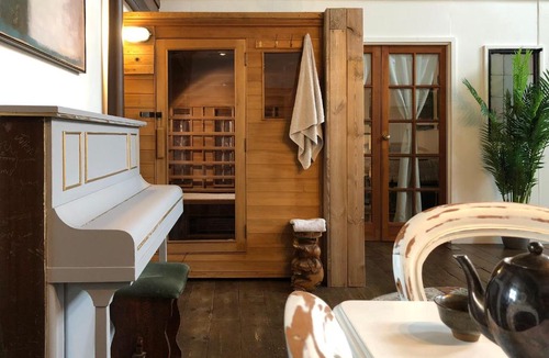 Briston House | Creative Norfolk Chapel with Piano and Sauna Sleeps 10