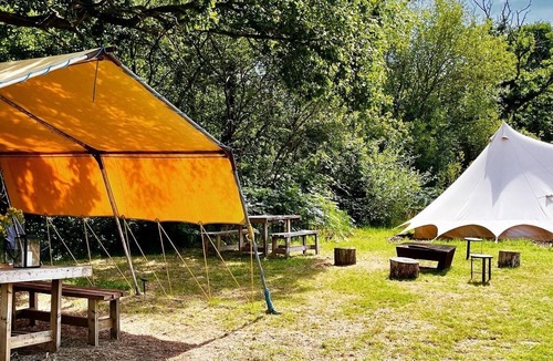 Cullompton RV Rental | Little bridge Camp. Secluded camping in 13 acres of magical meadow and woodland.