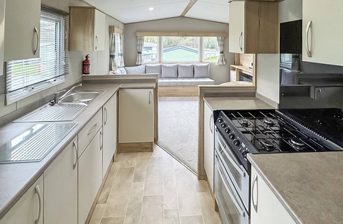 Llanrhystud House | Luxury caravan with one double and one twin room.