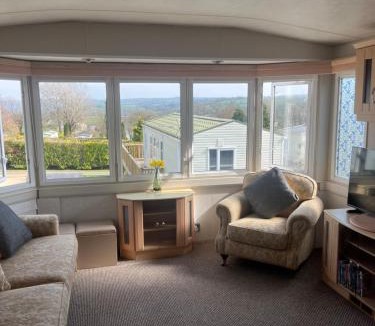 Narberth House | Modest static caravan Pool and views Narberth