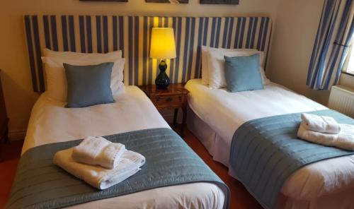 West Camel Hotel | OYO The Walnut Tree