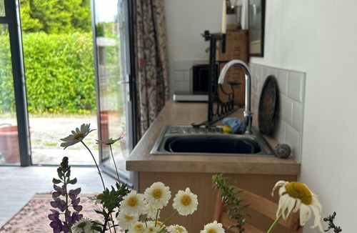 Par Apartment | Peaceful Cornish Hideaway with hot tub. Sea views from our hilltop garden.