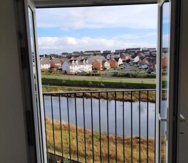 Airdrie Apartment | Pond View Upper
