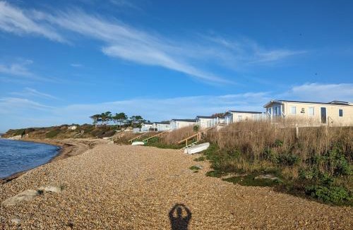 Holworth Resort | Regal Beachside pitch 22 Creek Caravan Park, dog friendly