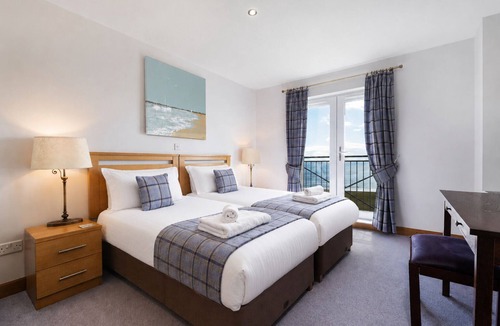 Brora Apartment | Second-floor 2-bedroom apartment with sea views overlooking the famous James Braid Brora Golf Course.