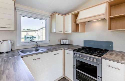 Helston House | Silver Caravan with parking & decking