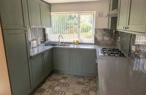 Batley House | Spacious detached home with fireplace, BBQ, and parking