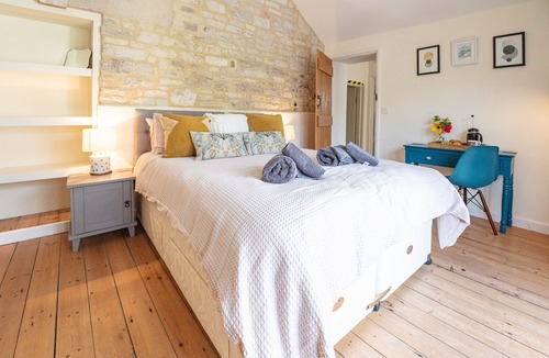 Holworth Cottage | Thatched former post office cottage in chocolate box village close to the sea