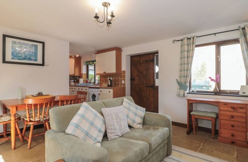 Compton Martin Cottage | THE COWSHED, romantic, with a garden in Regil