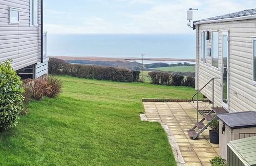 Swyre House | This comfortable stylish caravan offers beautiful sea and country views.