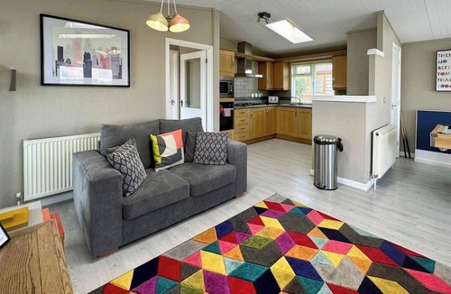 Raywell Ski Chalet | This deluxe two bedroom lodge even has its own games den.