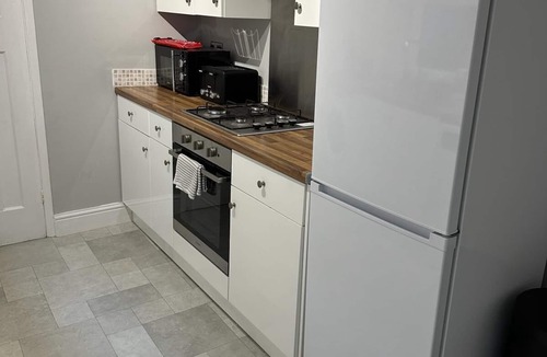Gloucester House | This three bedroom house features zip and link beds, one bathroom and a fully equipped kitchen.