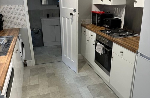 Gloucester House | This three bedroom house features zip and link beds, one bathroom and a fully equipped kitchen.