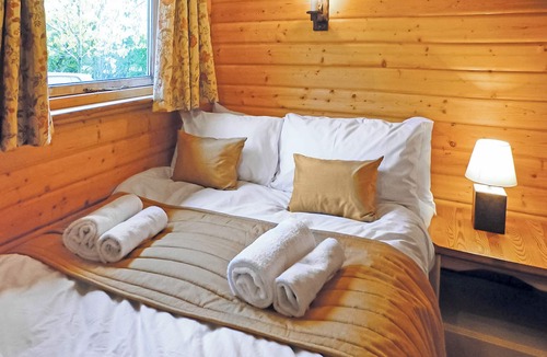 Cullompton Ski Chalet | Timber lodge with one queen size double and one twin.
