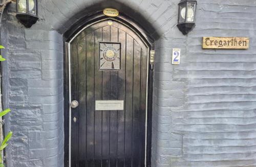 Looe House | Tregarthen Cottage - tranquil self-contained room near Looe offering easy parking right outside with EV point