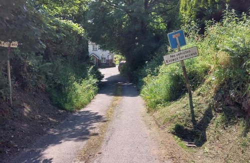 Looe House | Tregarthen Cottage - tranquil self-contained room near Looe offering easy parking right outside with EV point