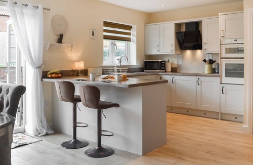 Langtoft Cottage | We love the open plan living area with wood burner.