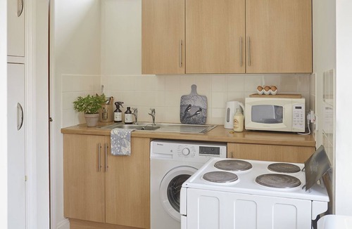 Newport Cottage | Willows - a barn that sleeps 2 guests in 1 bedroom plus 2 on sofa bed [lounge]