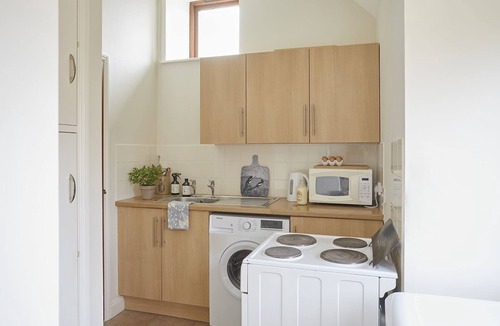 Newport Cottage | Willows - a barn that sleeps 2 guests in 1 bedroom plus 2 on sofa bed [lounge]