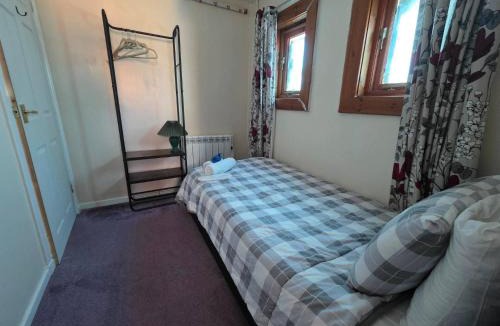 Mainland House | Woodlands Cottage cottage sleeps 5