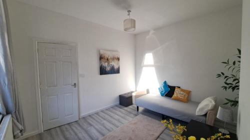 2 bedroom Large House For Contractors, And Family with a sofa bed
