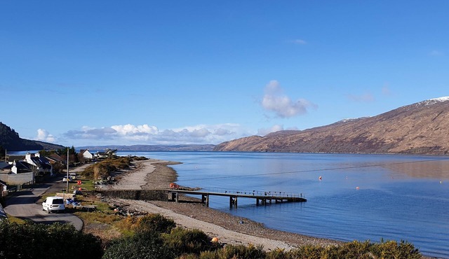 A spacious house with fantastic views across the bay to Skye with no pet fee.