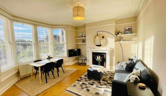 Bright, spacious apartment with off-road parking